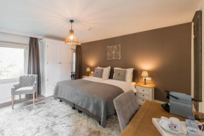  Charmehotel Klokkenhof  Брассат 